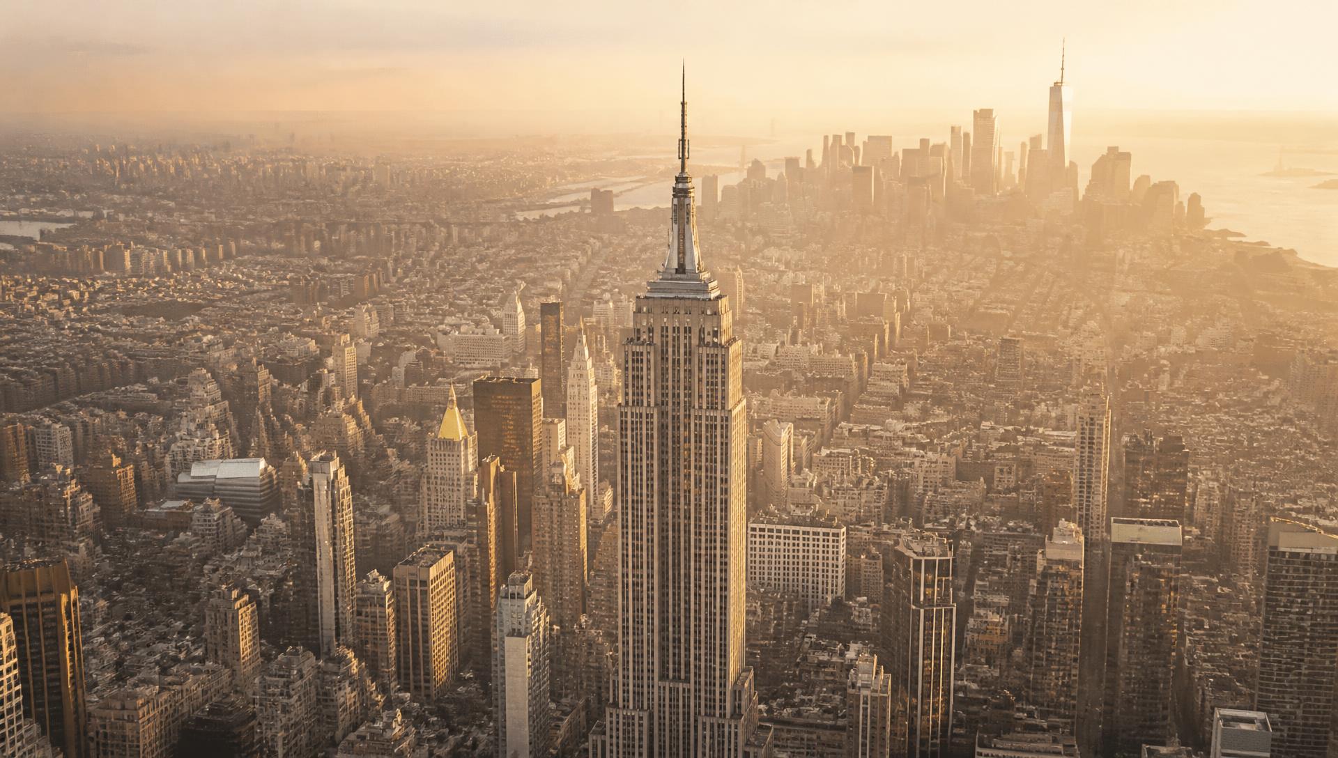 Aerial view of Midtown Manhattan with the Empire State Building at golden hour